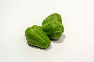 Sechium edule or fresh chayote isolated on white background. Food ingredient, vegetarian cuisine, organic farm plant