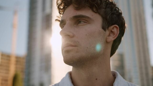 Close up face serious Caucasian man looking away male pondering confident businessman difficult decision think problem boss work employee expression business outdoors guy manager city student consider