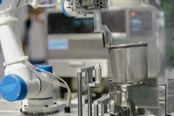 robot arm working in car factory