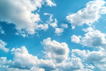 Blue sky with fluffy white clouds.