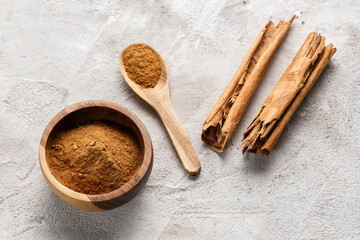 Cinnamon Sticks and Powder on White Background