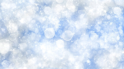 Abstract blue and white bokeh background with twinkling lights.