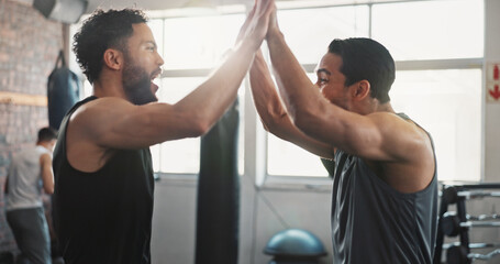 Fitness, men and high five in gym for workout success, wellness challenge or training teamwork. Energy, personal trainer and celebration at sports center for exercise progress and performance support