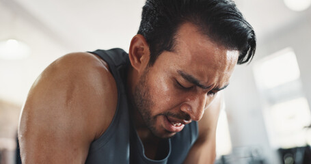 Gym, asian man and tired with sweat for workout, cardio training or exhausted for health fitness. Breathing, male person and bodybuilder with challenge for exercise session, wellness rest or recovery
