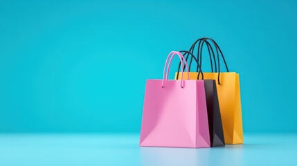 Two colorful shopping bags on a blue background.