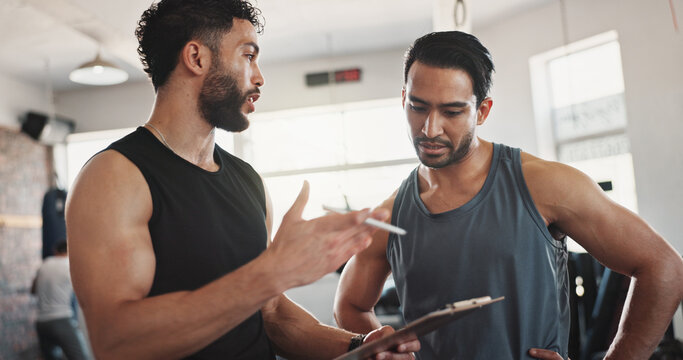 Fitness, advice and men in gym with clipboard for registration, sign up or workout schedule. Athlete, personal trainer and checklist for exercise plan, progress results or membership at sports club