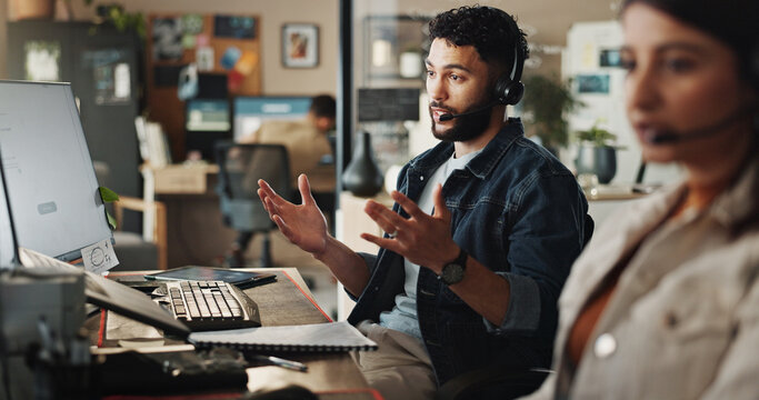 Businessman, agent or tech support with headphones at call center for web navigation or technical service. Male person, consultant or employee talking on computer for online advice or customer care