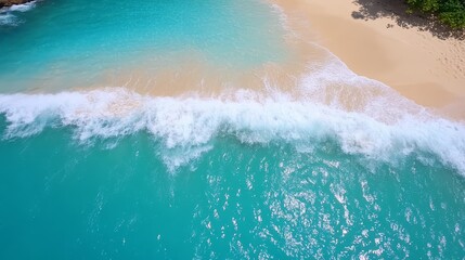 A view of a beach with waves crashing on the sand