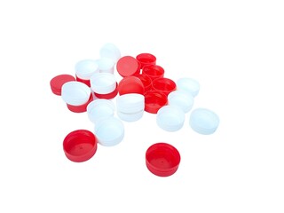 Isolated photo of white and red bottle caps. 