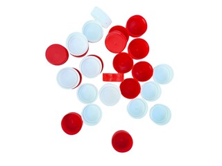 Flat lay photo style pf red and white bottle caps. 