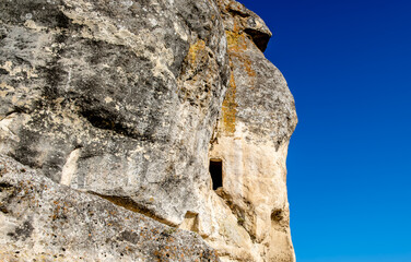A cut-out opening in the rock at a height of.