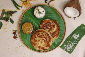 Malabar paratha, also known as Kerala paratha, is a flaky and layered flatbread popular in South Indian cuisine.