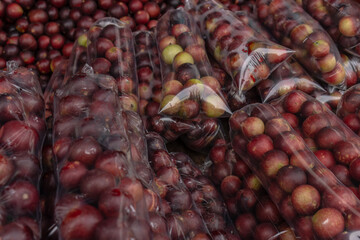 CAMU CAMU, AMAZONIAN FRUIT THAT GROWS ON THE BANKS OF RIVERS, DELICIOUS RED FRUIT KNOWN AS CAMU CAMU, DELICIOUS IN ICE CREAMS AND DESSERTS