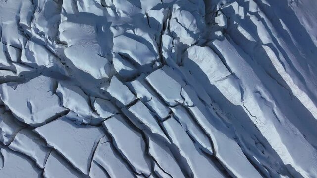 Switzerland Swiss Alps Crevasse Crevas Glacial Glacer iceberg ice crack layers Saas Fee aerial drone birdseye view summer autumn sunny daylight Alphabel Zermatt Matterhorn Jungfrau Grindelwald