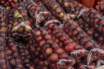 CAMU CAMU, AMAZONIAN FRUIT THAT GROWS ON THE BANKS OF RIVERS, DELICIOUS RED FRUIT KNOWN AS CAMU CAMU, DELICIOUS IN ICE CREAMS AND DESSERTS