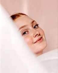 Minimalist Close-up of Woman with Soft Pink Background