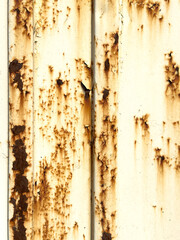 The image is of a rusted metal surface with a lot of scratches and dents