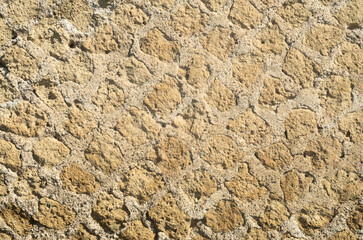 Part of roman wall from tufa stones (Opus reticulatum) in  Italy