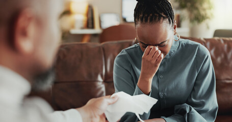 Psychologist, woman and crying in office, mental health and grief therapy with support....