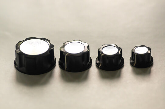 Control knobs. User interface design concept image. Variations of rotary knobs on neutral white background.