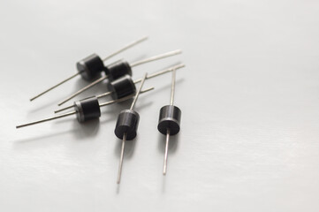 Semiconductor silicon rectifier diodes isolated on a white background.
