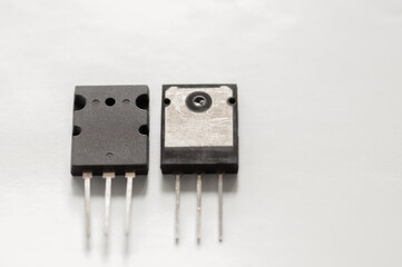 Semiconductor transistors and mosfets isolated on white background.