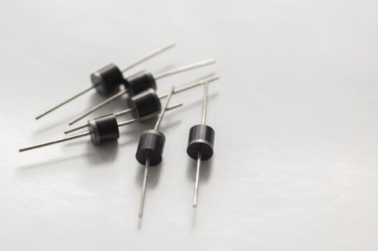 Semiconductor silicon rectifier diodes isolated on a white background.