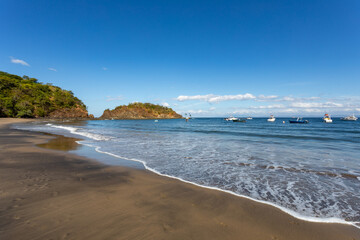 Playa Ocotal and Pacific ocean, rocky shore, El Coco Costa Rica