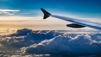 Fototapeta premium Airplane in the sky over a cloudy sky