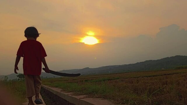 Little girl walking playground in sunset