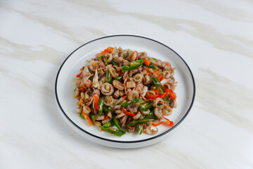 stir-fried salted squid with green chili. Perfect for recipe, article, catalogue, or any commercial purposes. with copy space.