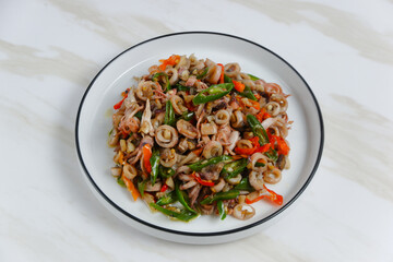 stir-fried salted squid with green chili. Perfect for recipe, article, catalogue, or any commercial purposes. with copy space.