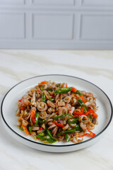 stir-fried salted squid with green chili. Perfect for recipe, article, catalogue, or any commercial purposes. with copy space.