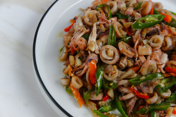 stir-fried salted squid with green chili. Perfect for recipe, article, catalogue, or any commercial purposes. with copy space.
