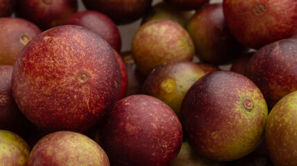 CAMU CAMU, AMAZONIAN FRUIT THAT GROWS ON THE BANKS OF RIVERS, DELICIOUS RED FRUIT KNOWN AS CAMU CAMU