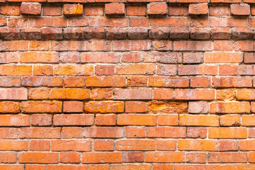 Obraz premium the old monastery wall built of red brick, brickwork texture, can be used for interior design
