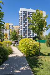 Modern apartment building with colorful facades on the outskirts of the city. Residential Complex 'In the forest', Moscow, Russia