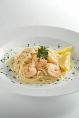Lemon shrimp pasta with parsley.