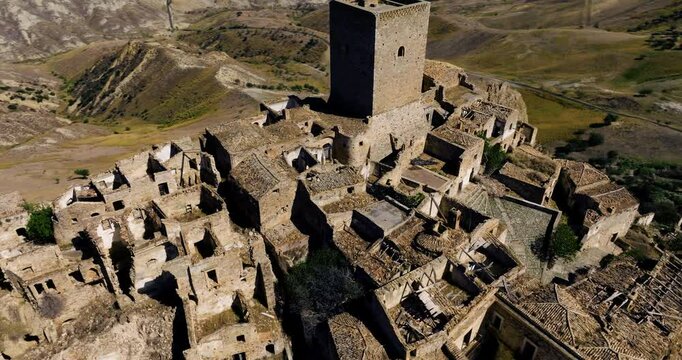 Abandoned Hillside Ghost Town Of Craco In Matera Province, Basilicata Italy. Aerial Drone Shot