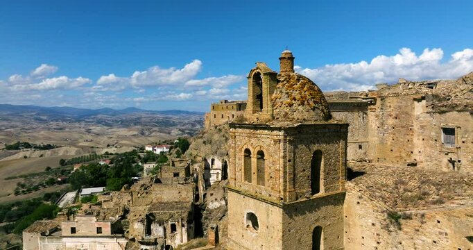 Ruins Of Medieval Ghost Town Of Craco In Italy In The Province Of Matera. Aerial Drone Shot