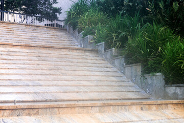 Urban object - water runs down stairs.