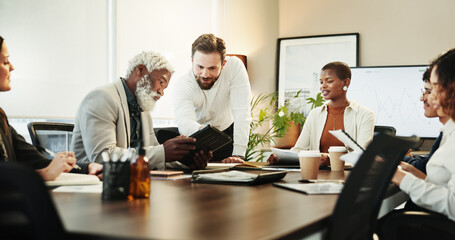 Business people, tablet and meeting in office for planning, news and project management. Team diversity, creative or technology in workplace for opportunity, collaboration or workshop for development