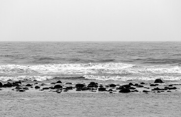 Sea shore with wave and rocks - minimalism photography