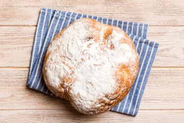 Fresh homemade crisp round bread on napkin, top view. Healthy unleavened bread. French bread. Top view Bakery products