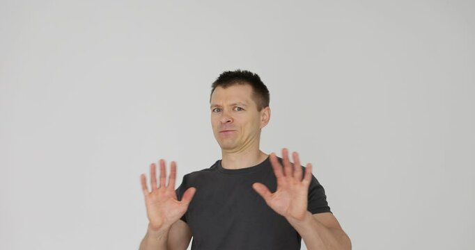 Man makes a disappointment and a gesture of denial