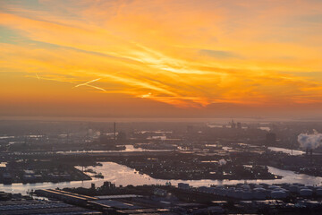 Aerial view of canal with port harbor outside Amsterdam during sunrise