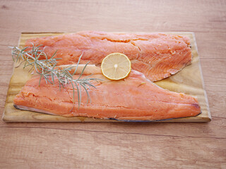 Salmon fillets ready for processing in the kitchen. Salmon is one of the most nutritious types of...