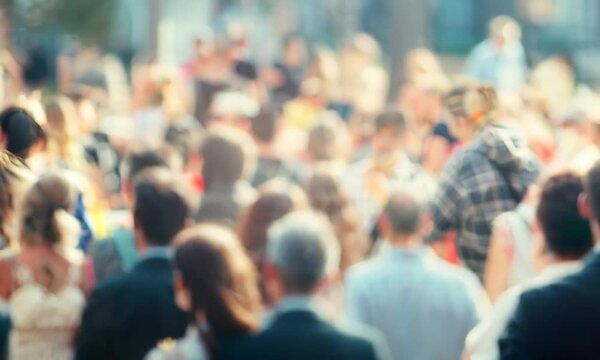 Blurred Crowd in Urban Setting with Warm Sunlight Bokeh Effect for Concept of Humanity and Togetherness : Generative AI
