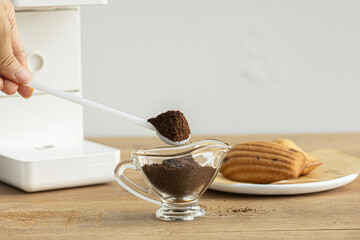 Coffee scoop with coffee beans isolated