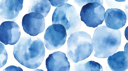 A beautiful watercolor pattern featuring various shades of blue circular shapes on a white background, creating a serene and artistic feel.